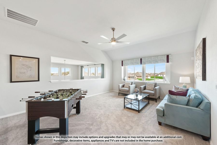 Bonus room with foosball table, seating area, vaulted ceiling, and ceiling fan