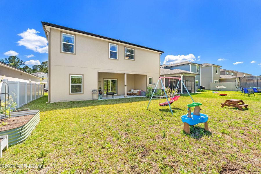 Exterior details and patio area of a home in Wilford Oaks, Orange Park (Image 4).