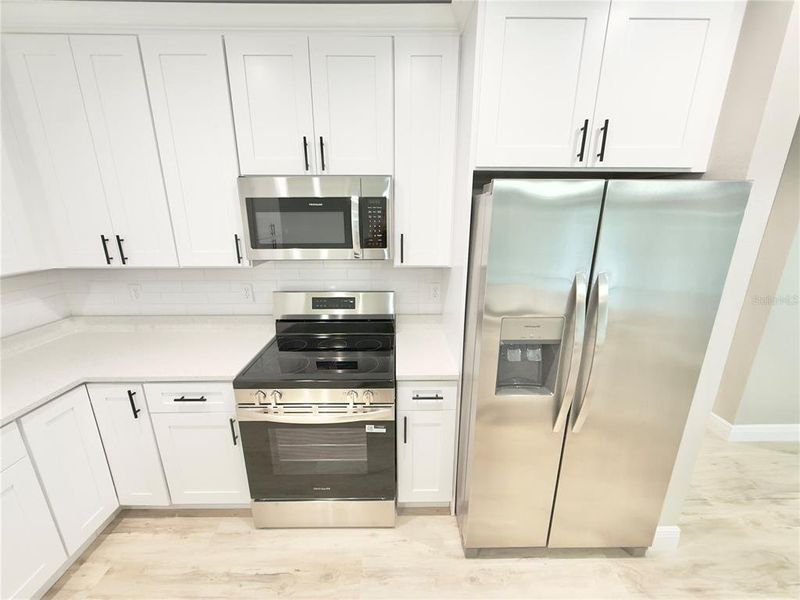 Furnished interior view inside a new home in , Port Charlotte (Image 3).