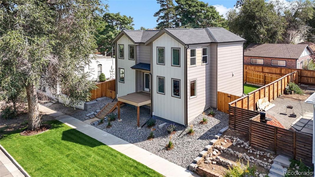 Front exterior of a new home in , Denver, CO, highlighting curb appeal (Image 32).