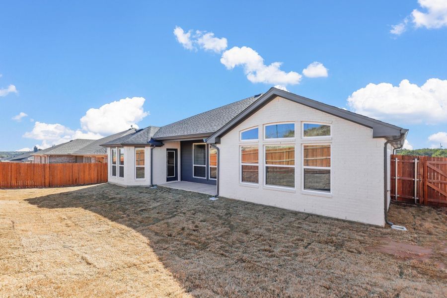 Representative exterior photo of a completed home built from the Iverson I by Cheldan Homes in Terra Vista, Springtown, TX (Image 31). Representative exterior photo of a completed home built from the Iverson I by Cheldan Homes in Terra Vista, Springtown, TX (Image 31).