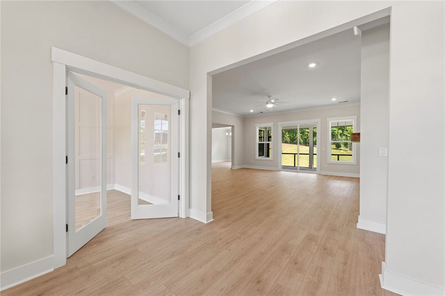 An inviting entry opens to a spacious living area