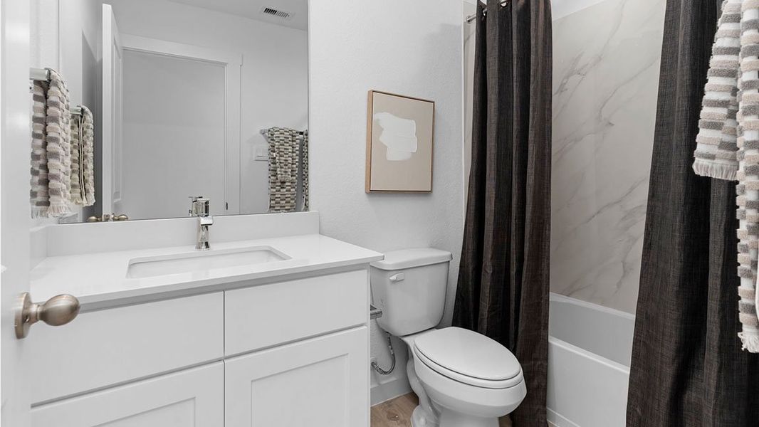 Furnished interior view inside a new home in Tamarron, Fulshear (Image 10).