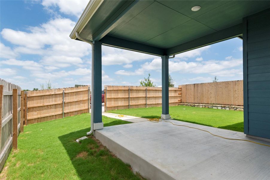View of yard with a patio area View of yard with a patio area