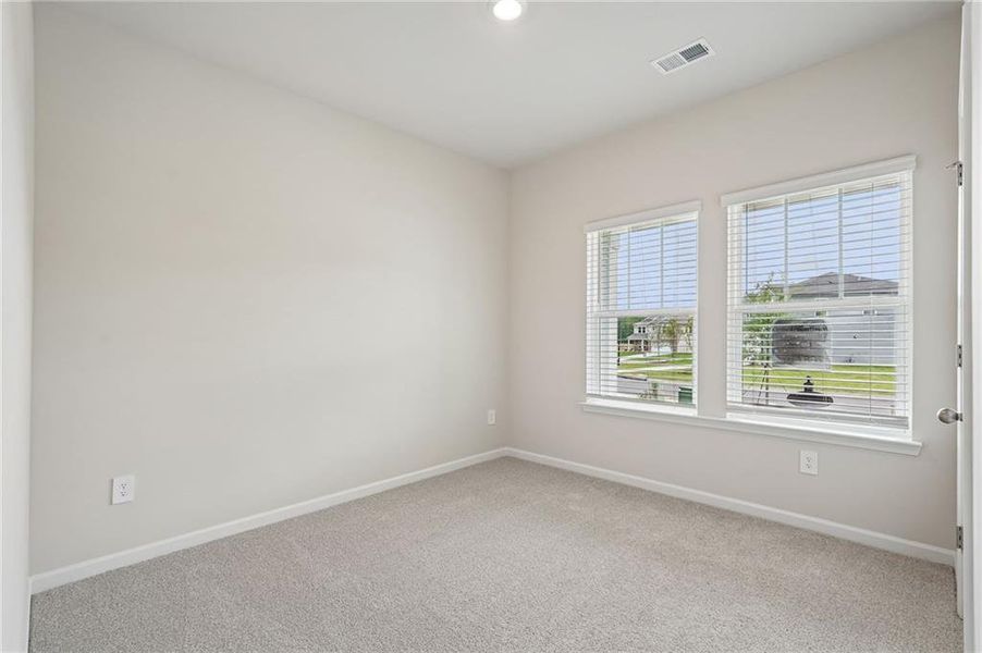 Spacious, unfurnished interior of a new home in Northwoods at Mirror Lake, Villa Rica (Image 47).