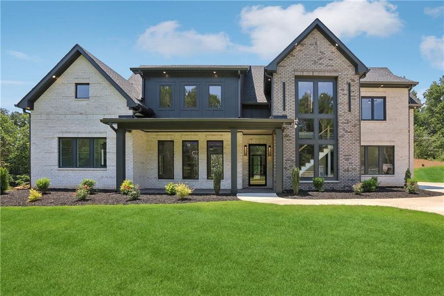Front exterior of a new home in , Braselton, GA, highlighting curb appeal (Image 33).