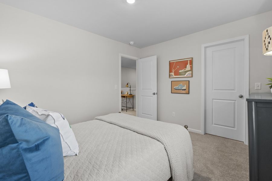 Representative furnished interior of a home built from the Myrtle L by McGuinn Homes in Canary Woods, Hopkins (Image 24). Representative furnished interior of a home built from the Myrtle L by McGuinn Homes in Canary Woods, Hopkins (Image 24).