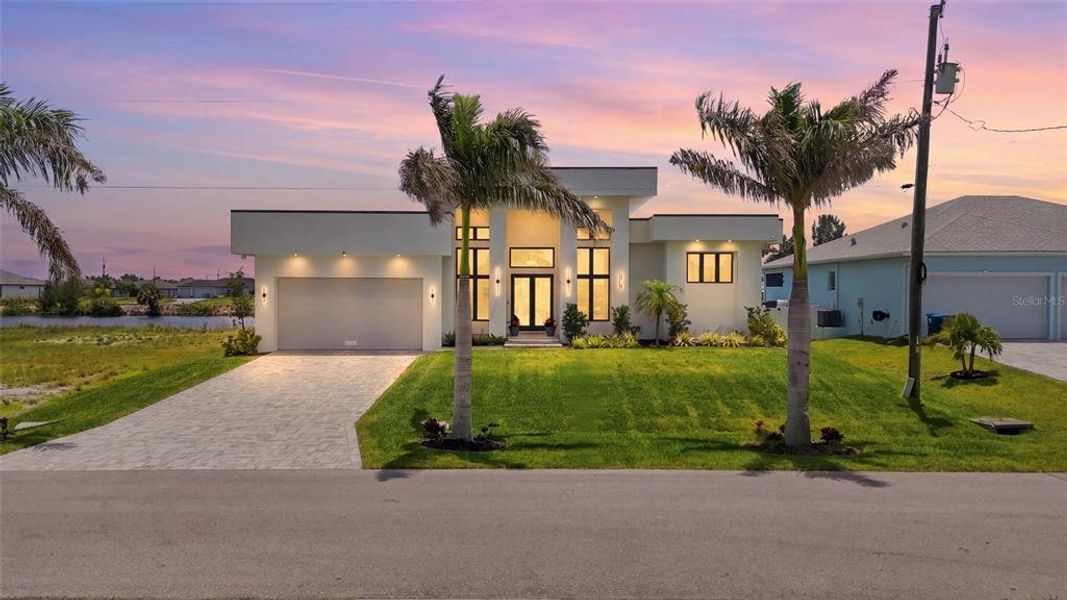 Front exterior of a new home in , Cape Coral, FL, highlighting curb appeal (Image 23).