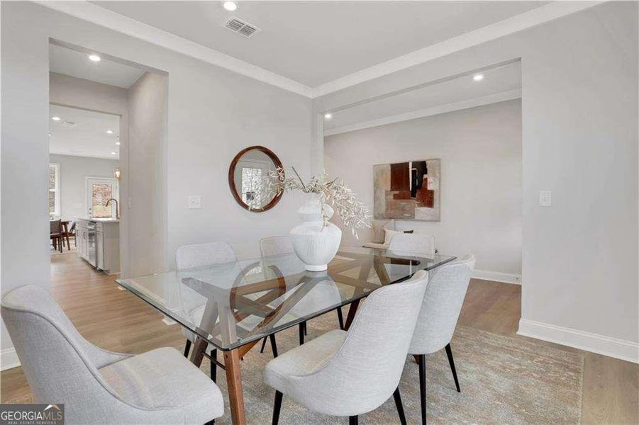 Furnished interior view inside a new home in The Paddocks at Doc Hughes, Buford (Image 9).
