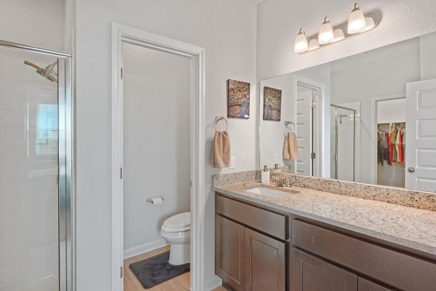 Furnished interior view inside a new home in Stallion Run, Buda (Image 18).