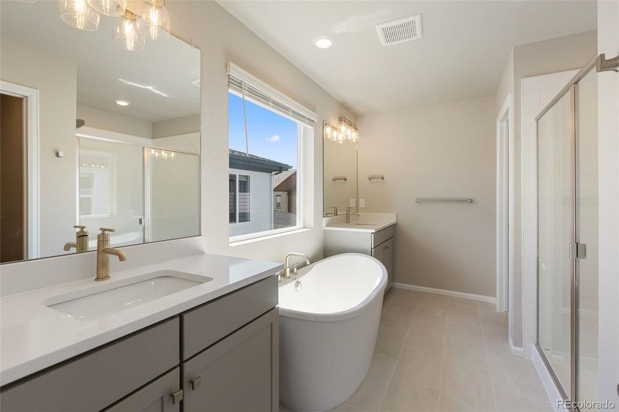 Furnished interior view inside a new home in Woodrose at Painted Prairie, Aurora (Image 11).