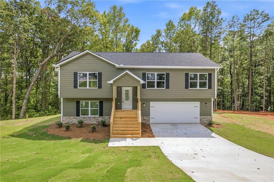 Front exterior of a new home in , Mount Airy, GA, highlighting curb appeal (Image 15).