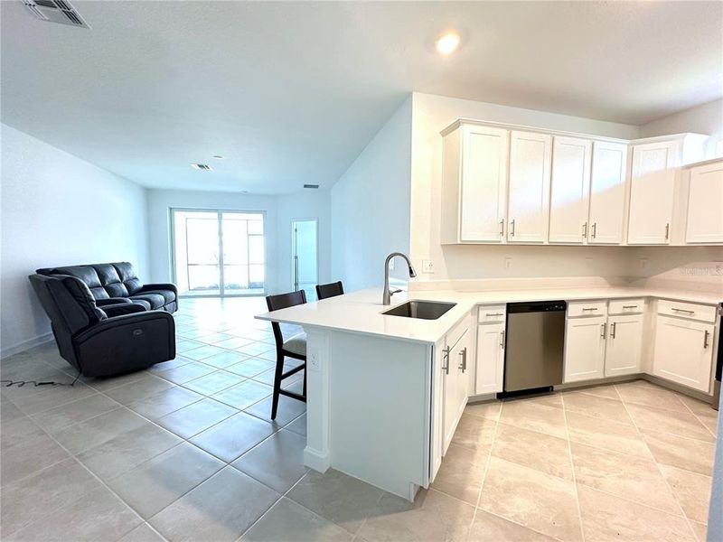 Furnished interior view inside a new home in Palm Lake at Coco Bay, Englewood (Image 14).