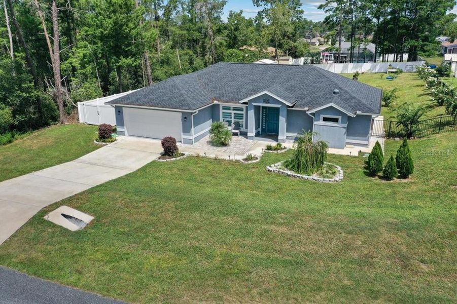Front exterior of a new home in , Ocala, FL, highlighting curb appeal (Image 23). Front exterior of a new home in , Ocala, FL, highlighting curb appeal (Image 23).
