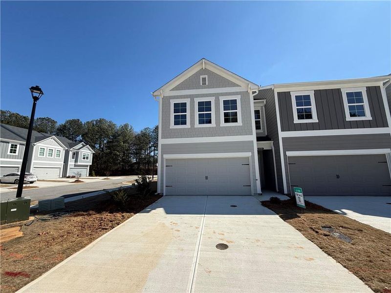 Front exterior of a new home in Longview Run, Decatur, GA, highlighting curb appeal (Image 15).