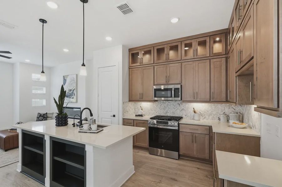 Furnished interior view inside a new home in Centero at Stone Oak, San Antonio (Image 12).