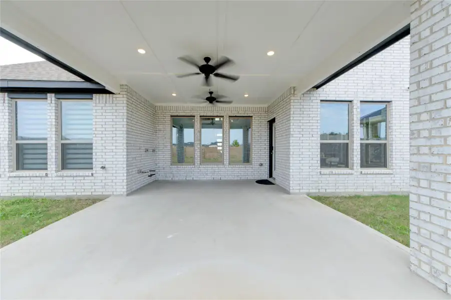 Exterior details and patio area of a home in , New Caney (Image 4). Exterior details and patio area of a home in , New Caney (Image 4).