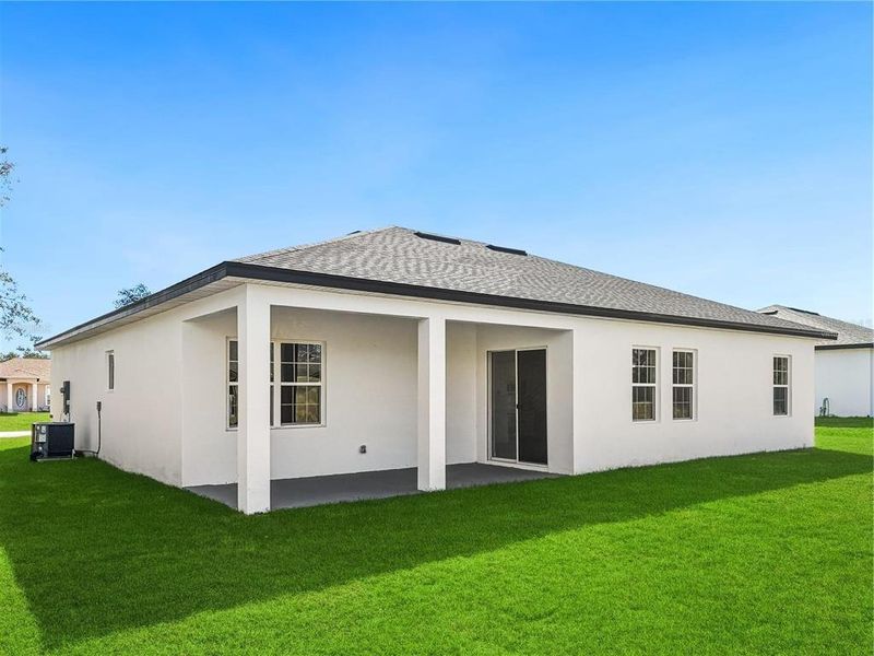 Exterior details and patio area of a home in , Ocala (Image 24).