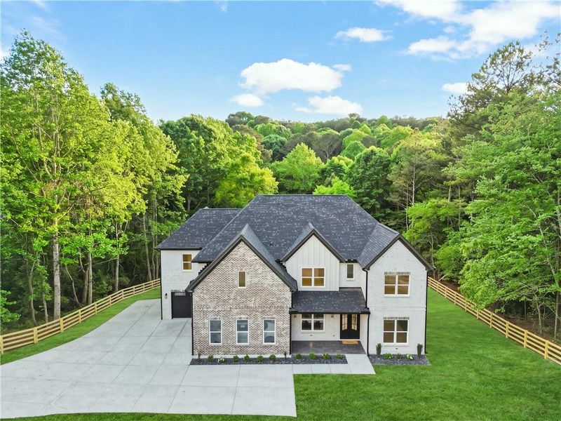 Front exterior of a new home in , Dacula, GA, highlighting curb appeal (Image 31).
