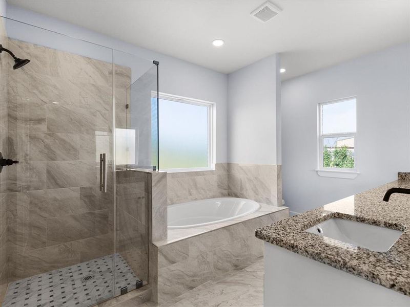 Bathroom featuring a garden tub, vanity, healthy amount of natural light, a stall shower, and recessed lighting