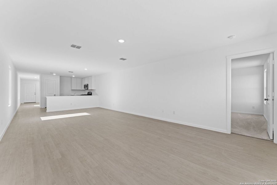 Spacious, unfurnished interior of a new home in Randolph Crossing: Cottage Collection, Converse (Image 18).