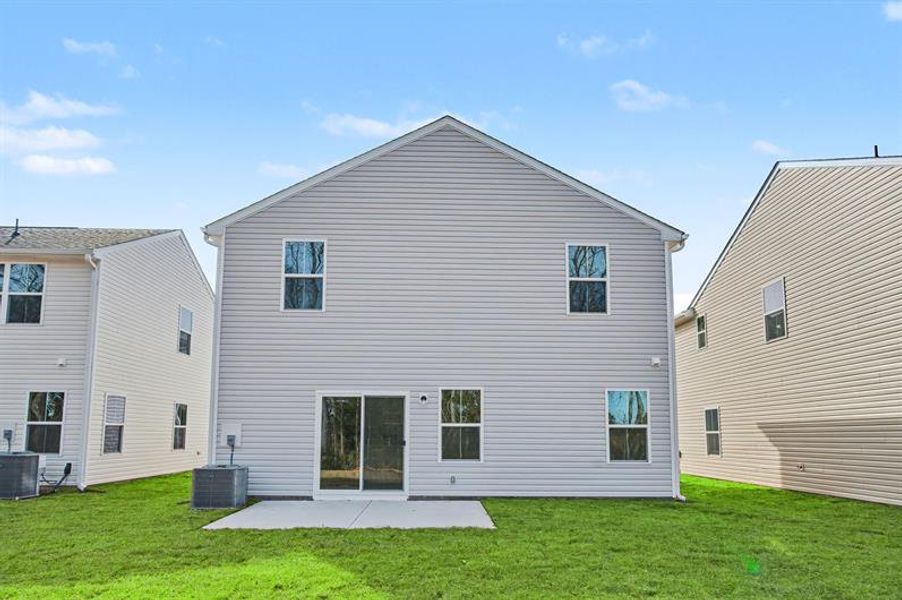 Exterior details and patio area of a home in Sterling Oaks, Ash (Image 2).