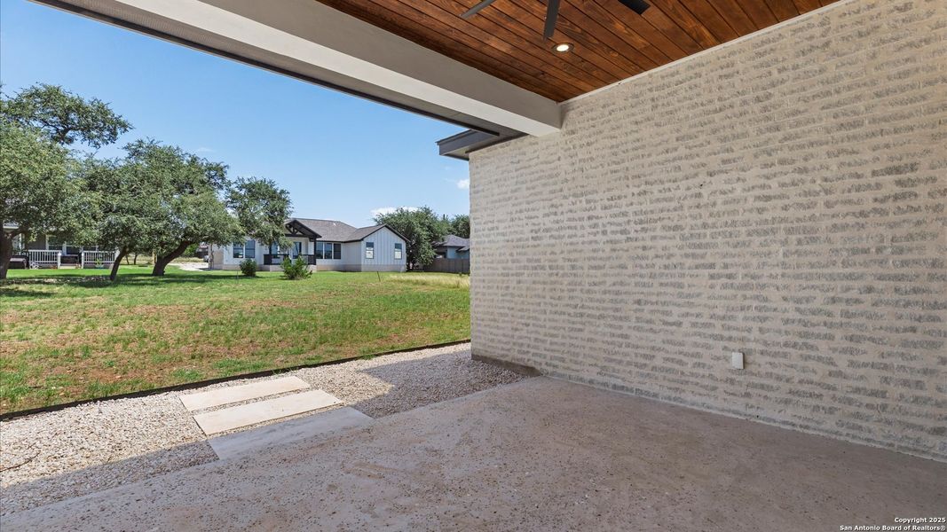 Exterior details and patio area of a home in , Blanco (Image 33).