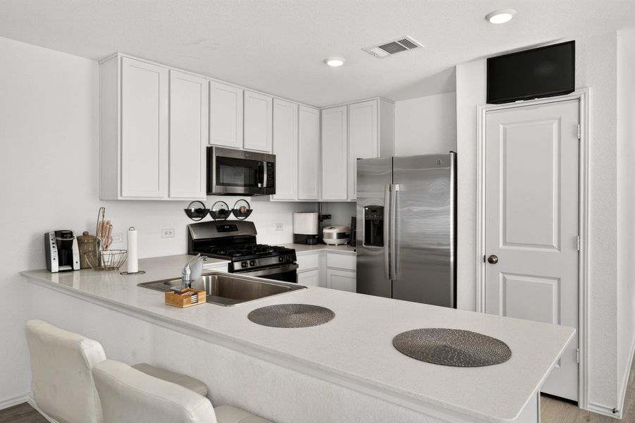 Furnished interior view inside a new home in Elm Creek, Elgin (Image 14).