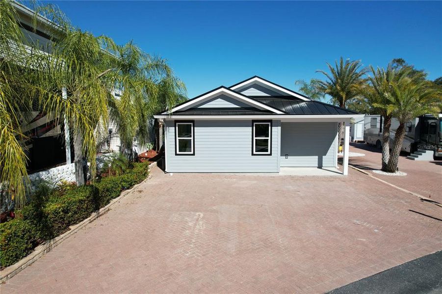Front exterior of a new home in , Davenport, FL, highlighting curb appeal (Image 2). Front exterior of a new home in , Davenport, FL, highlighting curb appeal (Image 2).
