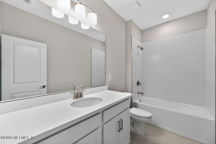 Furnished interior view inside a new home in Cherry Elm at SilverLeaf, St. Augustine (Image 11).