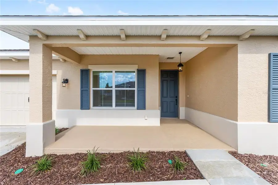 Exterior details and patio area of a home in , Ocala (Image 3).