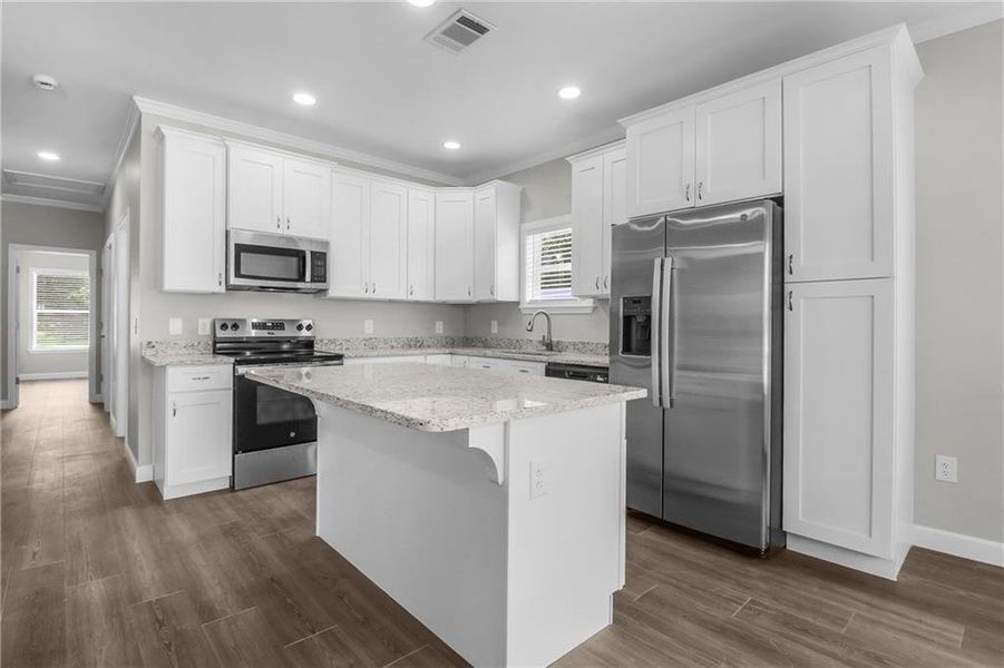 Furnished interior view inside a new home in , Ludowici (Image 10). Furnished interior view inside a new home in , Ludowici (Image 10).