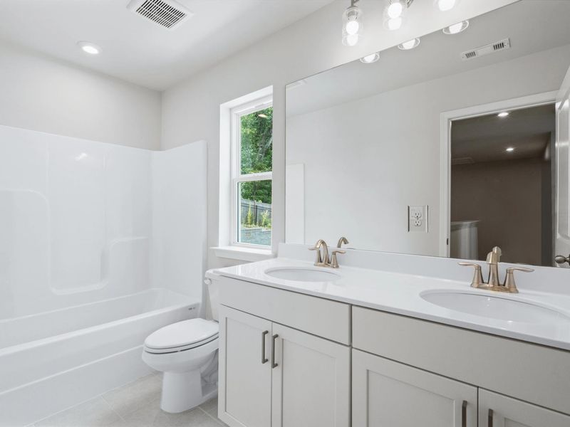 Representative furnished interior of a home built from the Cary A by Davidson Homes LLC in Lake Shore, Winder (Image 16).
