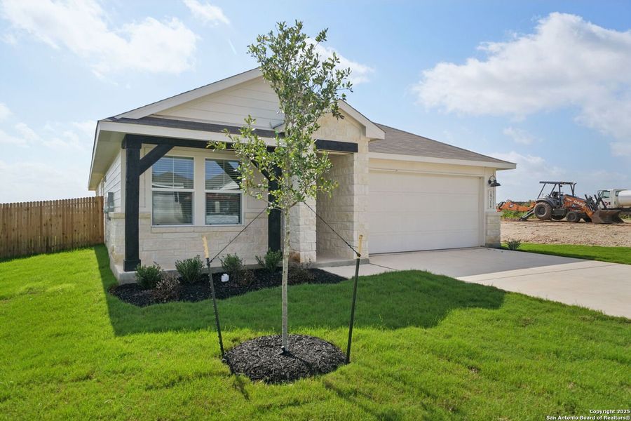 Front exterior of a new home in Estancia Ranch - Premier Series, San Antonio, TX, highlighting curb appeal (Image 2).
