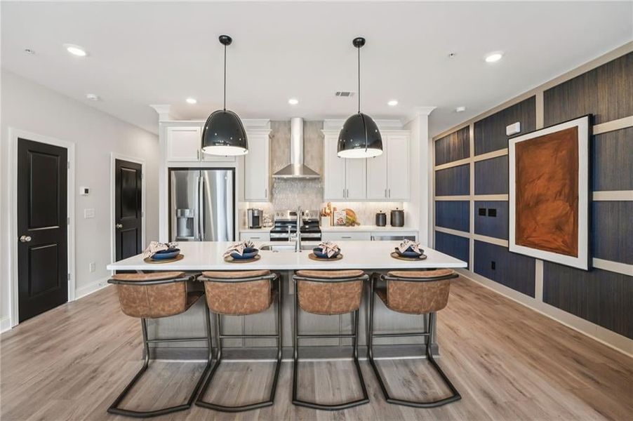 Oversized island anchors the kitchen