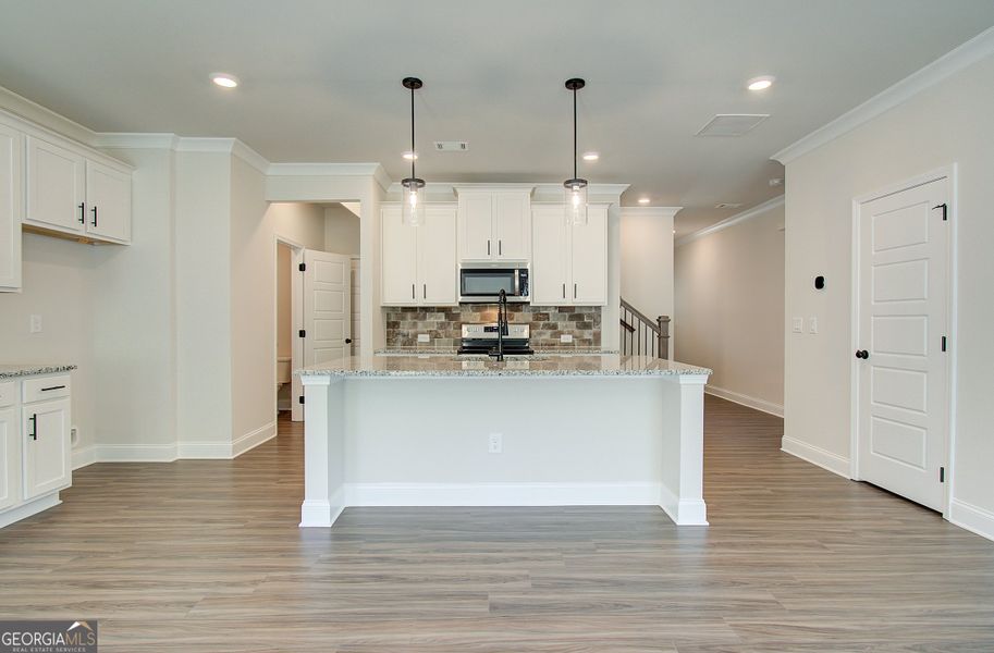 Furnished interior view inside a new home in The Towns at Auburn Station West, Auburn (Image 4).