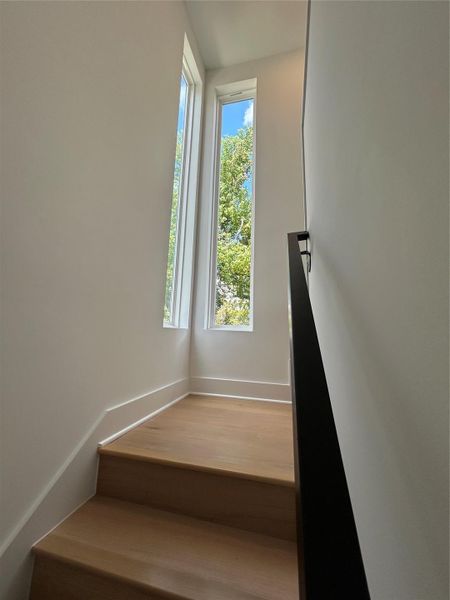 Windows on stairwell for extra natural light