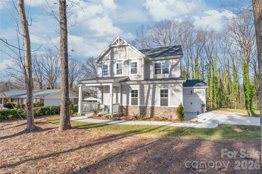 Front exterior of a new home in , Mooresville, NC, highlighting curb appeal (Image 25).