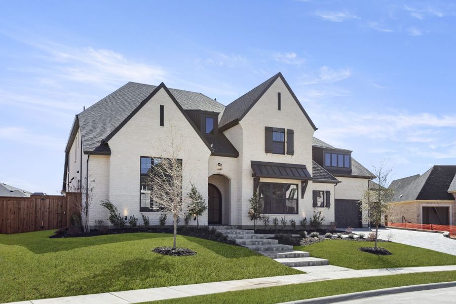 Front exterior of a new home in Mustang Lakes, Celina, TX, highlighting curb appeal (Image 27). Front exterior of a new home in Mustang Lakes, Celina, TX, highlighting curb appeal (Image 27).