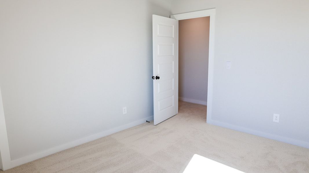 Representative unfurnished interior of a home built from the TISDALE by D.R. Horton in Harvest Point, Spring Hill (Image 48).
