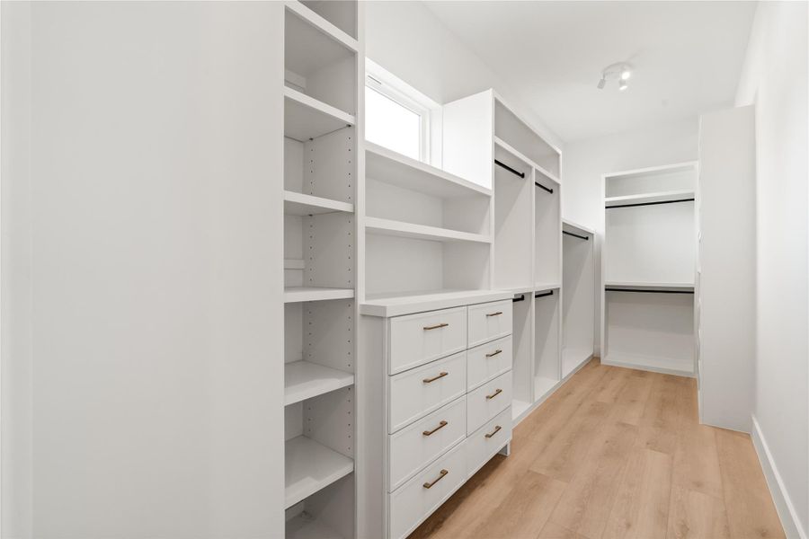 Custom shelving, drawers, and multiple hanging sections give you real, organized storage — the kind that actually fits a household's whole wardrobe. It's a closet built to keep life simple.