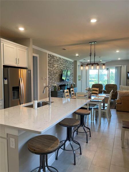 Furnished interior view inside a new home in Del Webb Sunbridge, St. Cloud (Image 7).