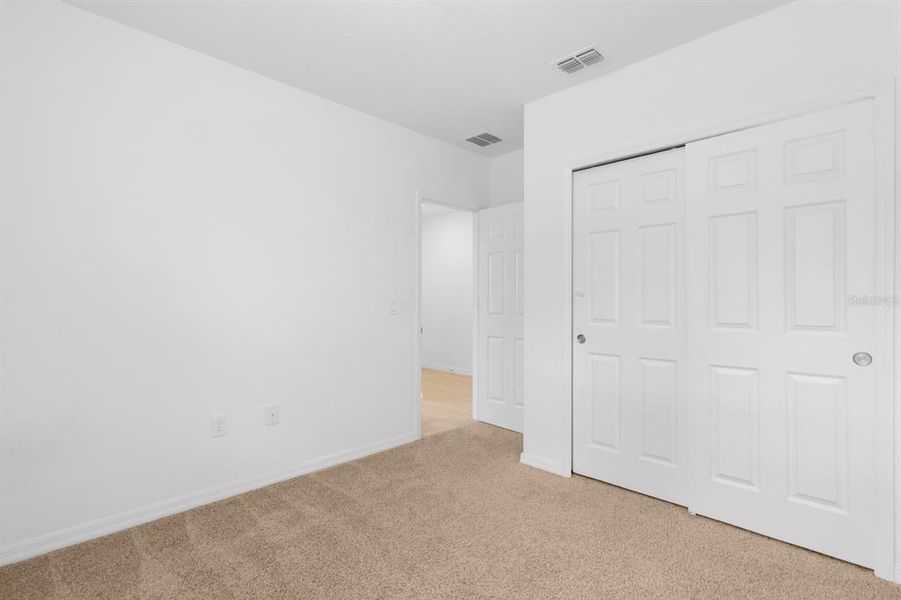 Spacious, unfurnished interior of a new home in Lawson Dunes - Signature Series, Haines City (Image 23).