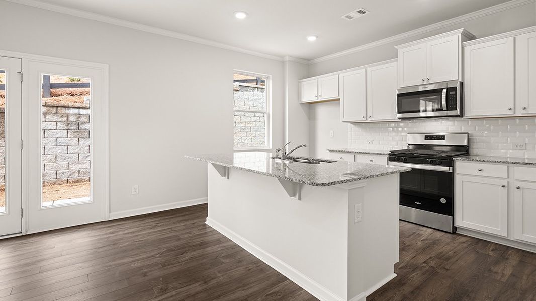 Representative furnished interior of a home built from the PENWELL by D.R. Horton in Palisades, Dallas (Image 31).