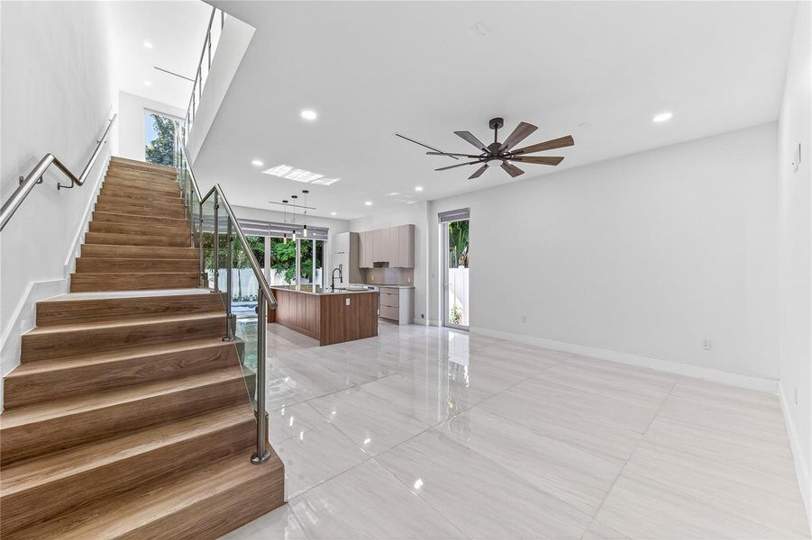 With view into dining and kitchen