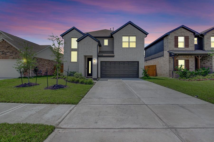 Front exterior of a new home in , Houston, TX, highlighting curb appeal (Image 19).