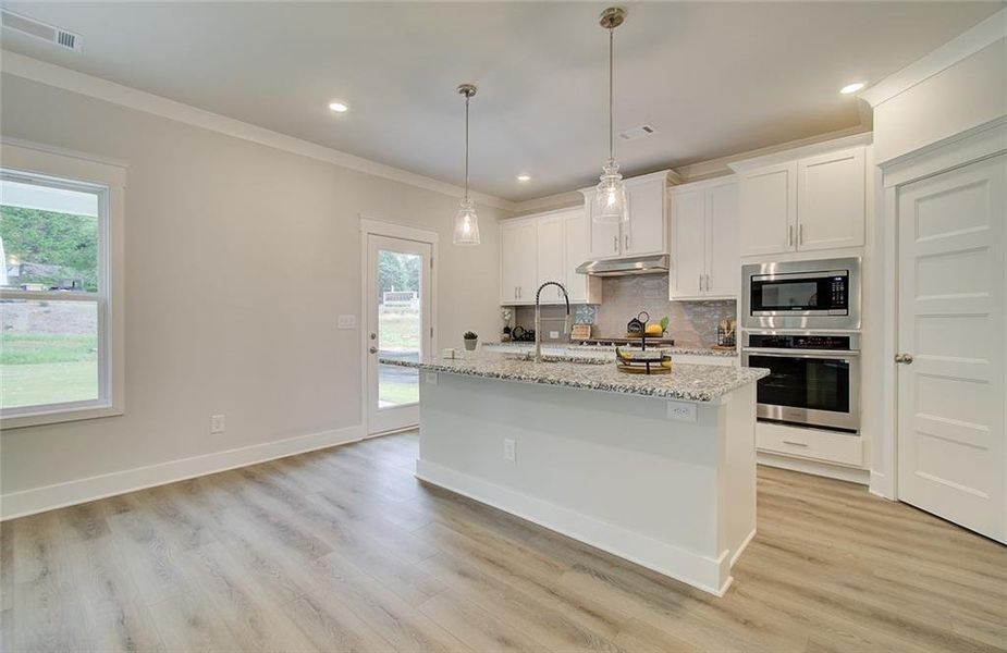 Furnished interior view inside a new home in Ponderosa Farms Estates, Gainesville (Image 5).