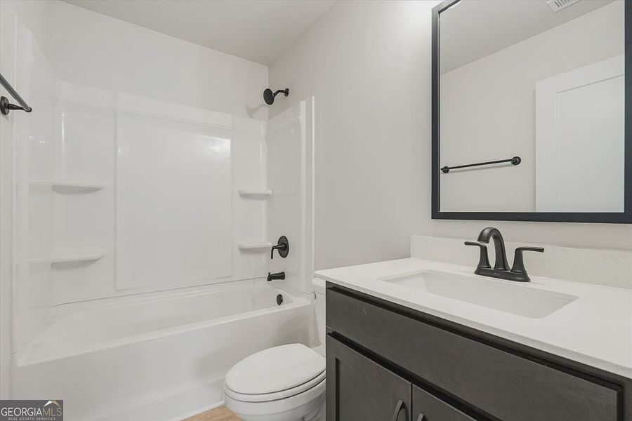 Furnished interior view inside a new home in Canterbury Villas, Carrollton (Image 18).