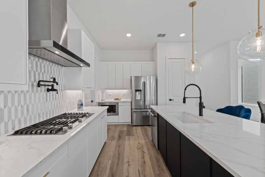 Representative furnished interior of a home built from the Plan 2 by Monarch Homes in Royal Court, Frisco (Image 14).