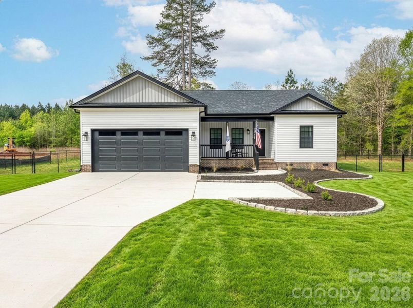Front exterior of a new home in , Crouse, NC, highlighting curb appeal (Image 25).